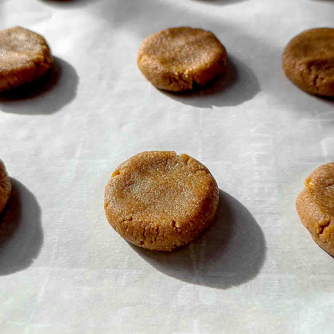 flatten cookie dough ball for gingerbread cookies