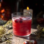 cranberry, apple cider cocktail or mocktail that's halloween themed