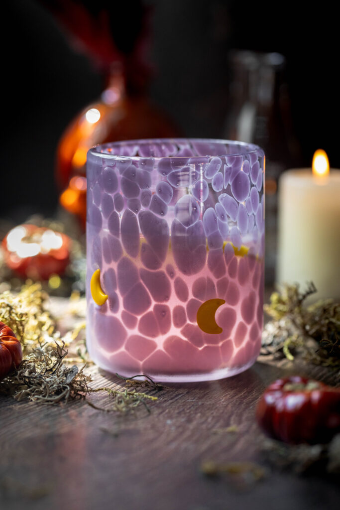 halloween theme purple gin and tonic cocktail