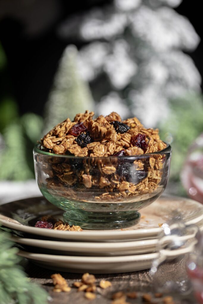 bowl of holiday spice granola and dried fruit